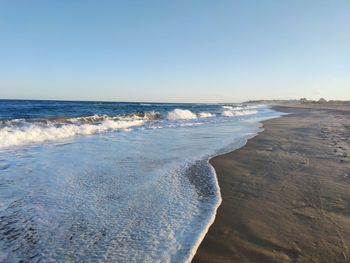 Scenic view of sea against clear sky