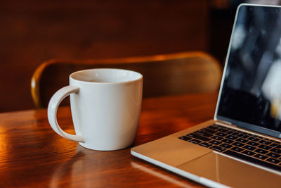 Coffee cup on table