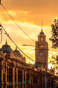 View of clock tower against cloudy sky