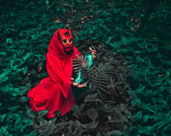 High angle view of woman on red land