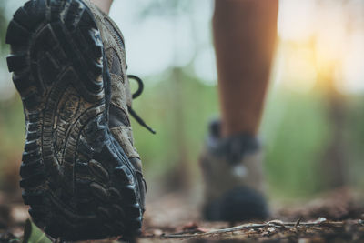 Low section of person wearing shoes outdoors