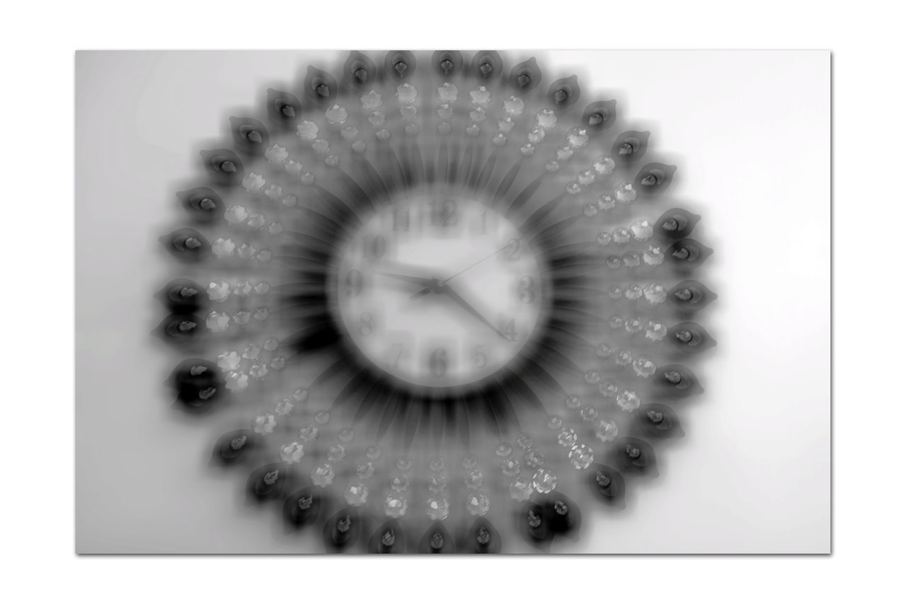 human eye, spiral, studio shot, eyelash, indoors, clock, circle, technology, white background, close-up, black and white, cut out, geometric shape, single object, time