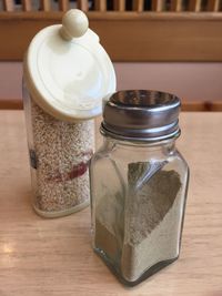 Close-up of ice cream in jar on table