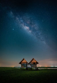 Built structure on sunny day against sky at night