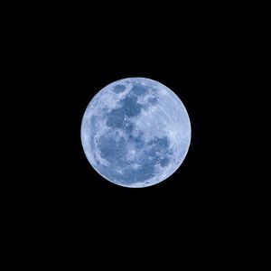 Scenic view of full moon against sky at night