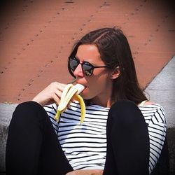 Portrait of woman eating food