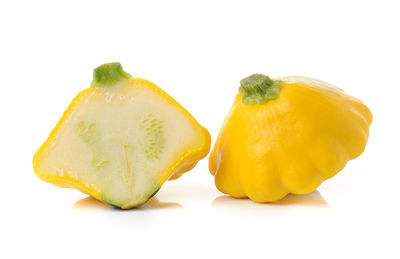 Close-up of lemon slice against white background