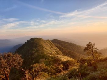 Scenic view of mountains against sky during sunset