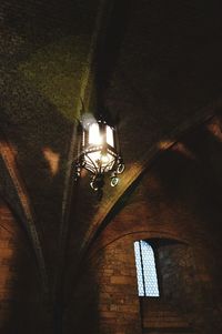 Low angle view of illuminated lamp