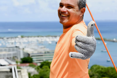 Man preparing to practice rappel on elevador lacerda, the postcard of salvador, bahia, brazil.