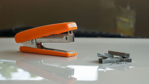 Close up of the stapler on the table