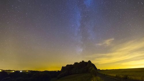 Scenic view of star field against sky at night