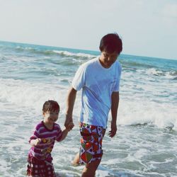 Boy looking at sea