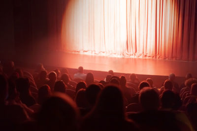 Spotlight on red curtains theater stage