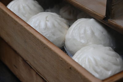 High angle view of meat buns in steamer