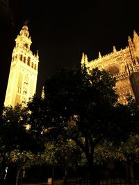 Low angle view of built structure at night