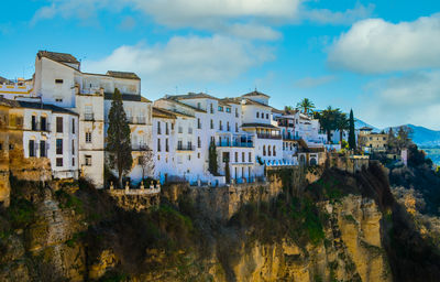 Houses built on the edge of the cliff, in the ancient city of ronda, spain.