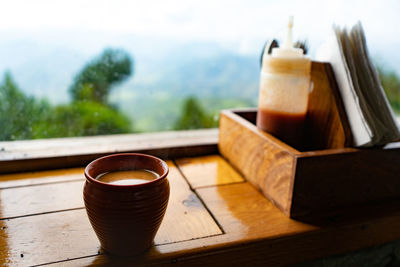 Close-up of coffee cup on table