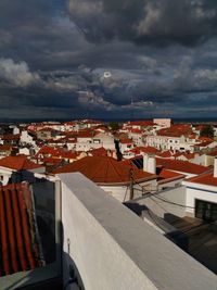 High angle view of houses against sky