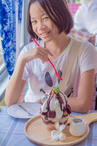 Portrait of girl having ice cream