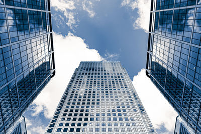 Low angle view of modern buildings against sky