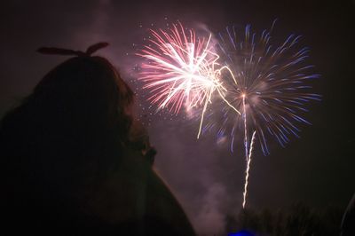 Firework display at night