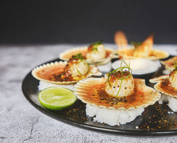 Close-up of sushi in plate on table