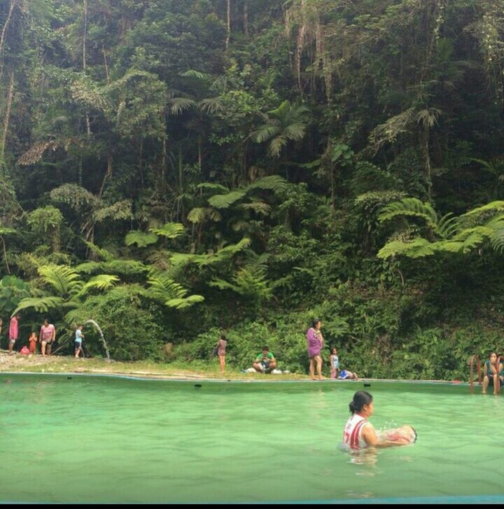 PEOPLE IN SWIMMING POOL