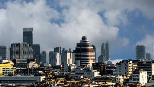 Modern cityscape against sky