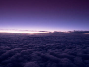 Scenic view of landscape against cloudy sky