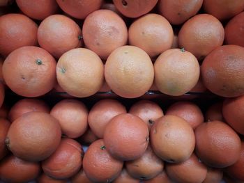 Full frame shot of oranges in market