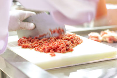 Close-up of person preparing food