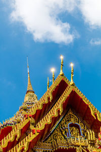 Low angle view of temple against blue sky