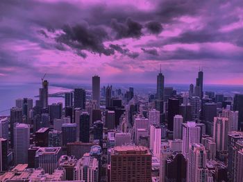 High angle view of buildings against sky during sunset