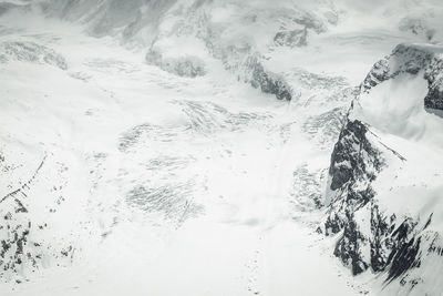 Scenic view of snowcapped mountain against sky