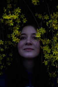 Close-up of young woman looking away