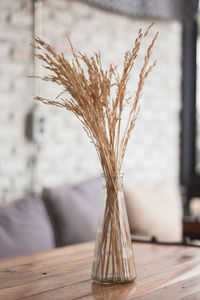 Close-up of wheat on table