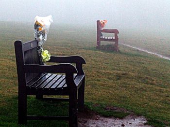 Empty chair and table on landscape