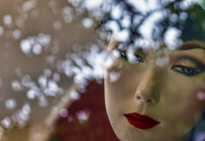 Close-up of mannequin at store window