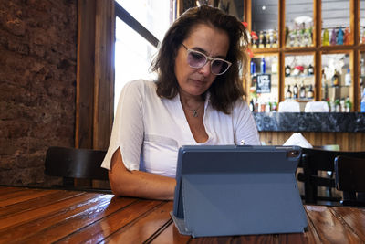 Portrait of businesswoman in a bar