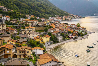 High angle view of townscape by sea