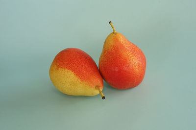 Close-up of fruit against white background