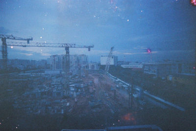 Aerial view of city against sky