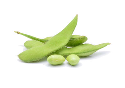 Close-up of beans against white background