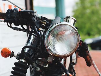 Close-up of motorcycle headlight