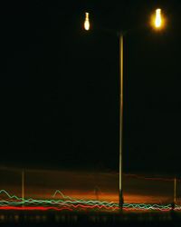 Low angle view of illuminated street light