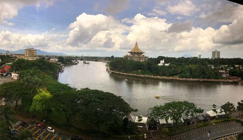 Panoramic view of pagoda against cloudy sky