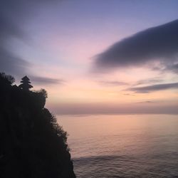 Scenic view of sea against sky at sunset