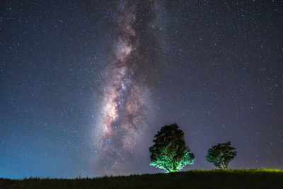 Scenic view of star field against sky at night