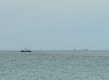 Boat sailing in sea